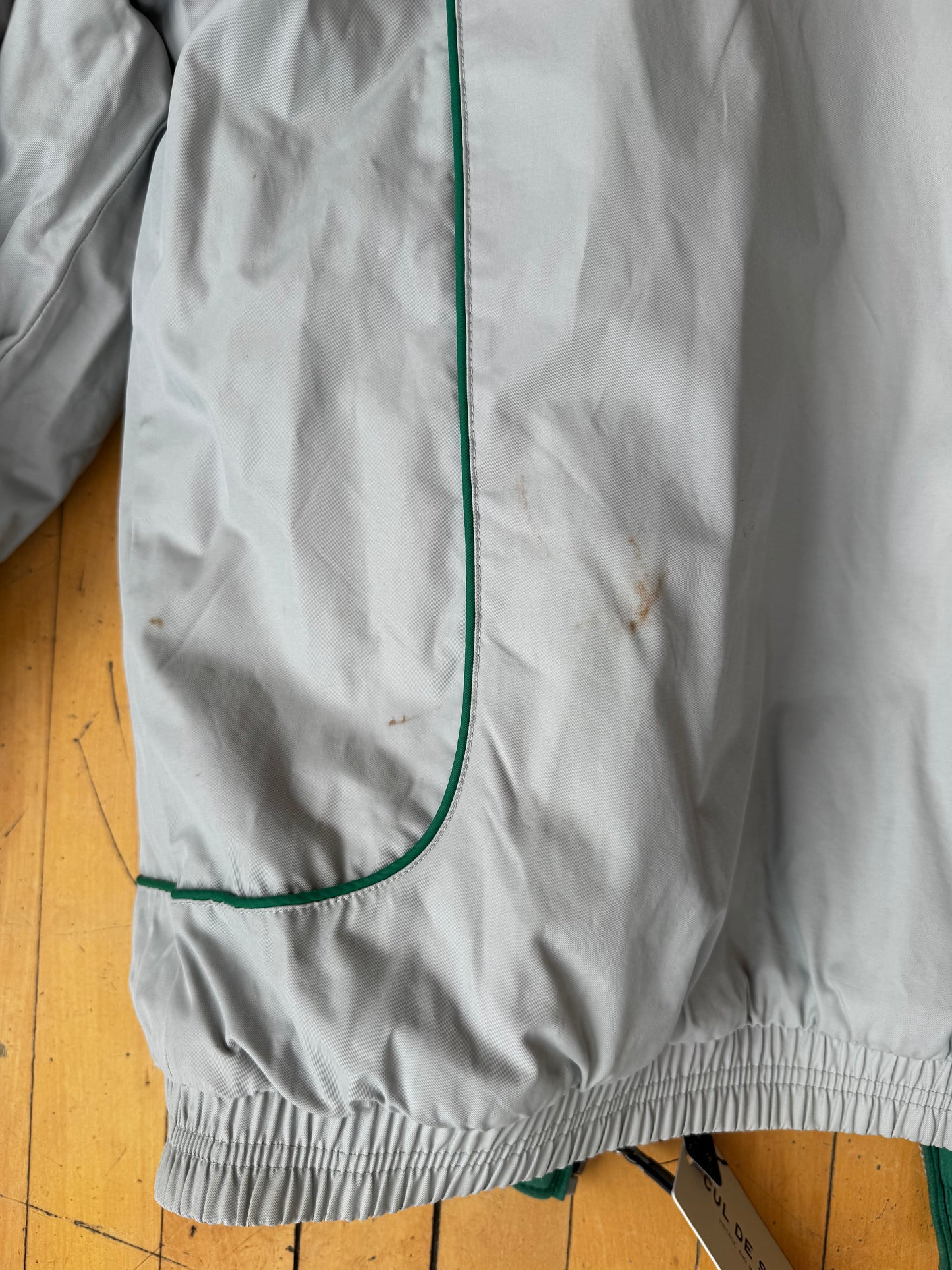 VINTAGE REVERSIBLE FIGHTING SIOUX PUFFER JACKET (M)